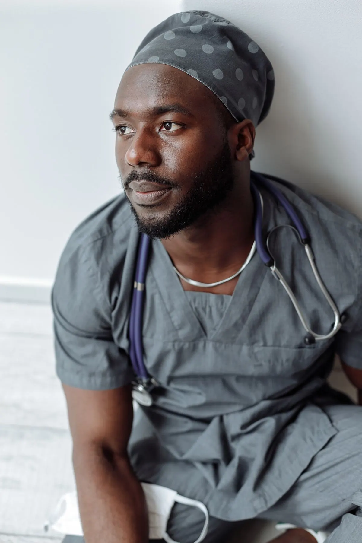 A male nurse in scrubs